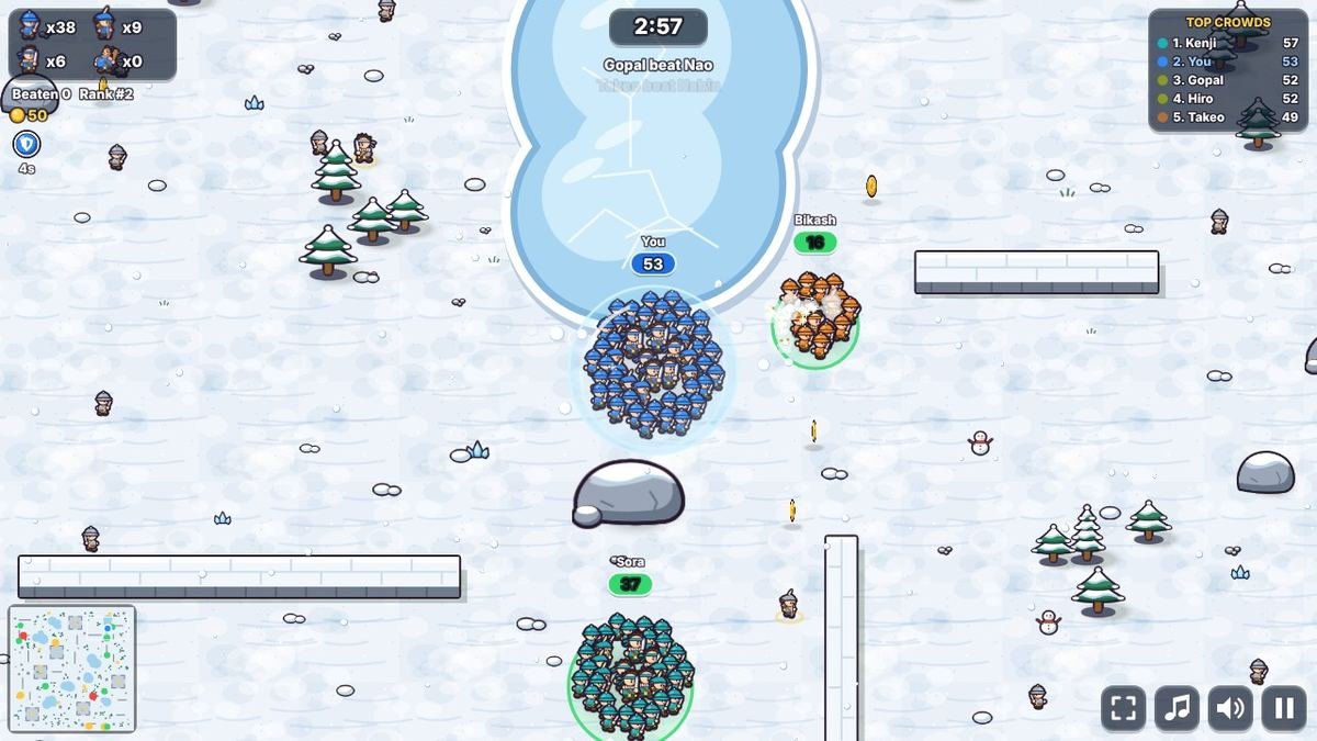 Crowd Clash on the Snow map: a blue crowd by a frozen lake, with snowy pine trees, rocks, walls and two green-ring crowds